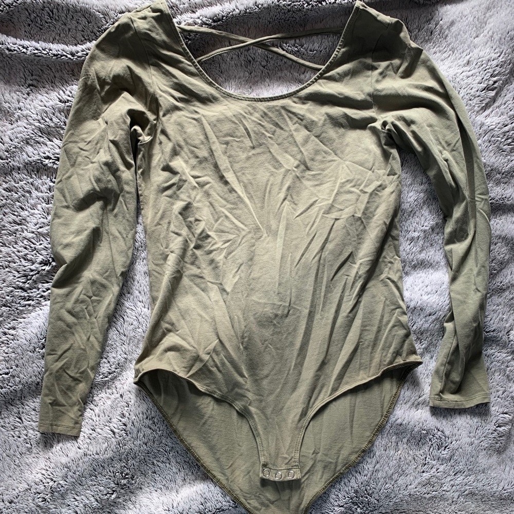 Long sleeved body suit